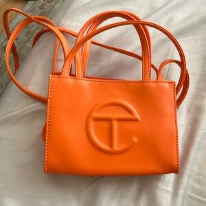 Telfar orange small bag. Authentic . Minor wear on one corner.